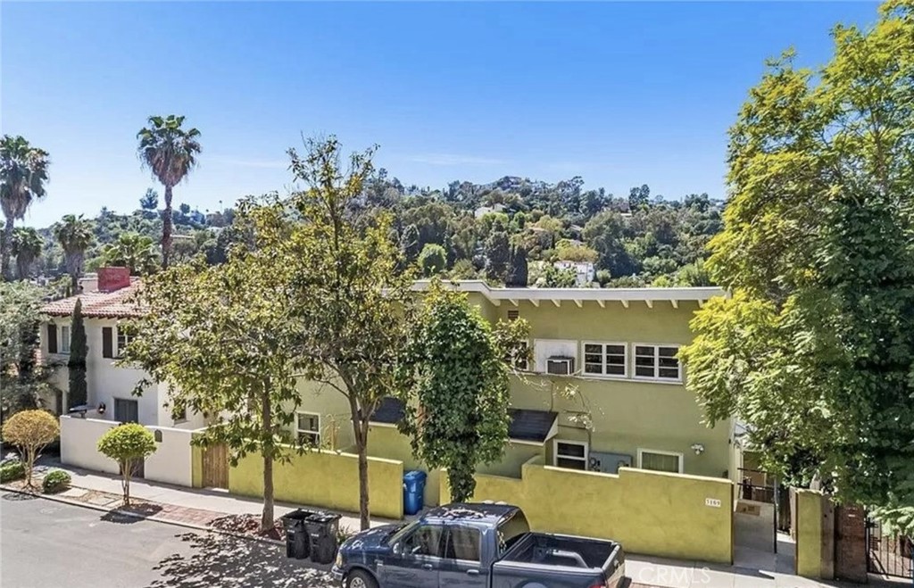 Your chance to own this Spanish style 4 plex in the neighborhood of Hollywood Hills that generates great income! This property has 2 separate buildings of duplex, the 2 units on Cahuenga Blvd. are single story 1 bed 1 bath and the 2 units on Hollycrest Dr are 3 levels 1 bed & 1.5 bath with a loft area and high ceilings. Seller has put Brand New Roof on 2 of the units. All unit has separate Gas and Electricity Meters. This property is close to Hollywood Bowl, Universal Studios, and major freeways.