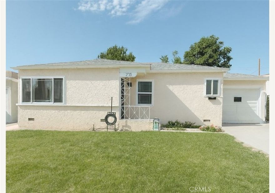 Charming remodeled single-story home featuring 2 bedrooms and 2 baths, 1076sqft living space. Enjoy a brand new roof, upgraded kitchen, and convenient laundry room. Includes a detached 1-car garage and a spacious backyard with ADU potential- perfect for extra income or multigenerational living.