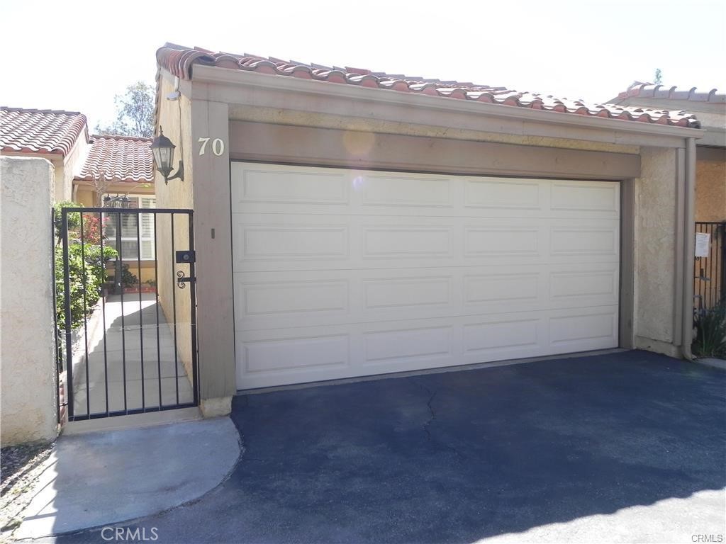 Fabulous 3 Bedroom, 2.5 Bath Park Northridge Townhome. This sparkling gem features laminate wood flooring, vaulted ceiling, plantation shutters recessed lighting and fireplace in the Living Room plus balcony access. Dining area also with vaulted ceiling, plantation shutters, and wet bar. Light, Bright Kitchen features built-in appliances, plenty of storage space, slider to patio and recessed lighting. One Bedroom and one bath are on the main level with balcony access, while two other bedrooms and one and a half baths are downstairs. Master features two closets plus balcony access. Well maintained complex has a lovely pool and spa area and plenty of guest parking. This is a great location and close to all. Hurry, this unit won't last. Sorry, no pets.