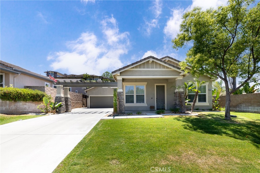 Welcome to this beautifully designed 3-bedroom, 2.5-bath pool/spa home nestled in the desirable Chapman Heights community—where comfort, convenience, and energy efficiency come together seamlessly.
Step inside to an open and inviting layout featuring a spacious great room, family room, and a large formal dining area—perfect for gatherings and entertaining. The upgraded kitchen boasts granite countertops, a center island with sink, large pantry, and newer stainless-steel appliances. The kitchen opens to the large family area complete with built-in surround sound and a granite fireplace, offering effortless indoor-outdoor flow to the private backyard oasis.
Outside, enjoy your own personal retreat with a tranquil waterfall pool and spa, a firepit for evening ambiance, and an insulated covered patio with ceiling fans and built-in speaker wiring—ideal for outdoor entertaining year-round with no neighbors directly behind you.
The primary suite is thoughtfully located at the rear of the home for privacy and features a door to the backyard, a luxurious ensuite bathroom with dual sinks, soaking tub, separate shower, and a walk-in closet. Two additional bedrooms are connected by a Jack and Jill bath, while a separate half-bath serves guests. A dedicated den with a second fireplace at the front of the home offers flexibility for a home office or additional living space.