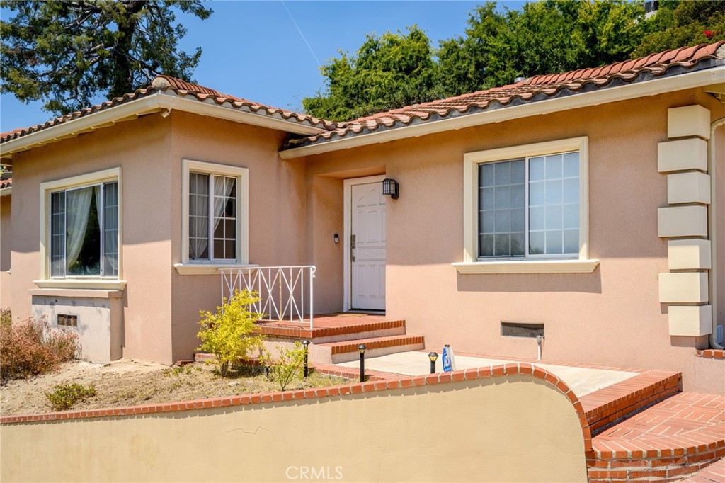 Welcome to this beautifully situated home in the highly desirable Glendale Hills! This spacious 3-bedroom, 2-bathroom residence offers 2,210 sq ft of comfortable living space on an expansive 22,210 sq ft lot — providing ample room for both indoor and outdoor living. Nestled in a peaceful hillside setting, the home features a bright and open layout with abundant natural light, ideal for everyday living and entertaining. The generous lot offers endless possibilities for outdoor enjoyment, expansion, or customization with sound entertainment system around the amazing pool overlooking beautiful hillside views. Located within the Rossmoyne/Verdugo Woodlands area, you'll enjoy privacy and tranquility while being just minutes from parks, top-rated schools, shopping, dining, and all that Glendale has to offer. A rare opportunity to own a hillside gem with exceptional potential! "possibility of an ADU at the top of the flat hillside"
