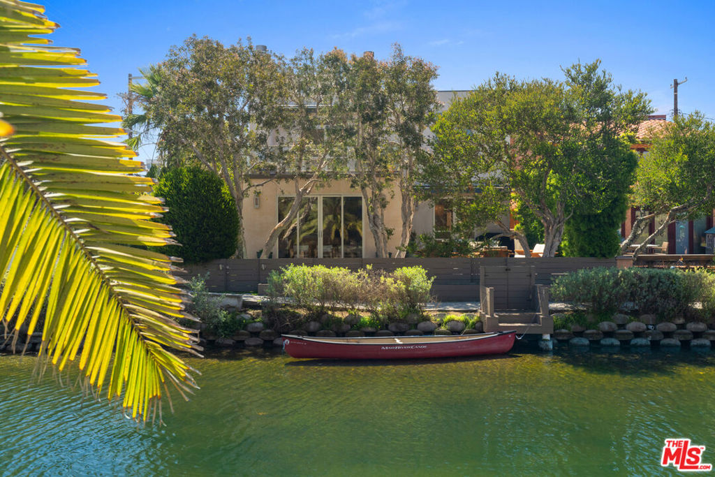 Contemporary Canal-Front Retreat on Sherman Canal. Wake up to tranquil water views that shimmer in the morning light and sparkle at night. Nestled on an oversized lot, this spacious 3-bedroom, 3.5-bath residence blends elegance with comfort. The home features a gourmet chef's kitchen with breakfast nook, a formal dining room, inviting living room, butler's pantry, and two versatile family rooms.Additional amenities include a 5 parking spaces (three-car garage & two cars in the driveway apron), central A/C, and in-home laundry. Perfectly positioned in the heart of Venice, you'll enjoy easy access to Abbot Kinney's vibrant shops and dining, as well as the beach just moments away. A must see!
