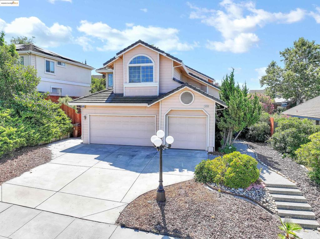 Welcome to 4426 Palisades Way. This two-story home offers 5 bedrooms and 3 full bathrooms, including a convenient downstairs bedroom and full bath, perfect for guests or multigenerational living. The updated kitchen is complete with granite countertops, stainless steel appliances, and ample cabinet space, ideal for everyday cooking and entertaining. The primary suite features a generous walk-in closet and a stunning ensuite bathroom with a large soaking tub and a spa-inspired stall shower. You will love the low-maintenance yard with mature fruit trees, and plenty of room to relax or garden outdoors. Great location, conveniently located near parks, Delta de Anza Regional trail, eBART and highway 4 access.