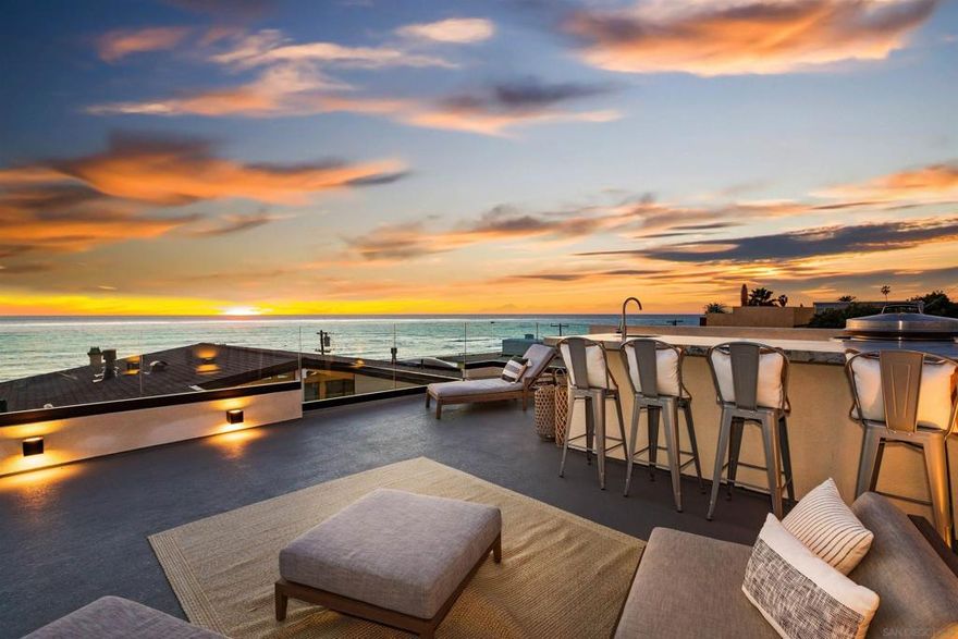 Phenomenal panoramic ocean, coastline, sunset, nightlight, and migrating wildlife views stretching from Coronado and Point Loma to the North Shore are embraced in this beautifully renovated home across from the surf, just a short stroll to Bird Rock Village restaurants and shops for enjoyment of an easy in-town, walking lifestyle. Vast walls of glass, sleek modern design with high ceilings, an open floor plan and large view decks invite seamless indoor-outdoor enjoyment of this magnificent site. Dazzle family and friends as you entertain on the expansive rooftop deck with sweeping unobstructed views, outdoor kitchen, seated bar, barbecue and plenty of lounge space for gatherings. Taking full advantage of the views, the primary bedroom with fireplace, cedar closet and gorgeous bath provides perfect retreat from a busy day. Absolutely fabulous.