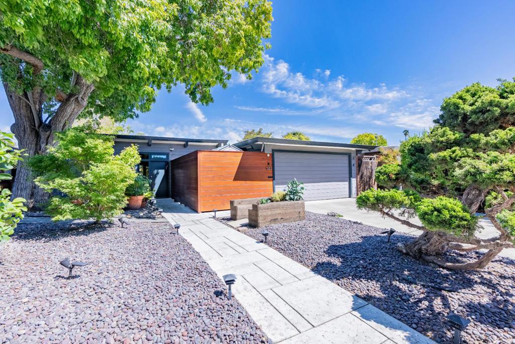A Timeless and Rare Mid-Century Eichler. This is the last remaining home to feature the original 1950s Eichler design and layout, a true collector's gem that has even been featured in a design magazine for its architectural integrity and rich history. Tucked away on a peaceful street with friendly neighbors, this one-of-a-kind home is within walking distance of schools, the vibrant Fair Oaks Park and slightly over a mile to downtown Sunnyvale/Caltrain. Inside, you'll find vaulted ceilings, oak hardwood floors, an exposed-brick fireplace, radiant heated floors and oversized dual-pane windows. A newly updated kitchen offers high-end stainless steel appliances, recycled glass-in-cement countertops, peninsula, and pantry. All bedrooms are generously sized with their own closets and the tranquil primary suite opens to a bonus solarium. Additional features include an insulated two-car garage with washer/dryer, a zenful backyard with Japanese-style landscaping and shed, plus a restored service yard complete with new cedar siding, concrete, sink and custom cabinetry. Ideally located near Silicon Valley's major tech hubs, with quick access to Highways 101, 237 and Central EXPY, this is a rare opportunity to own a true piece of mid-century history. Homes like this don't come around often.