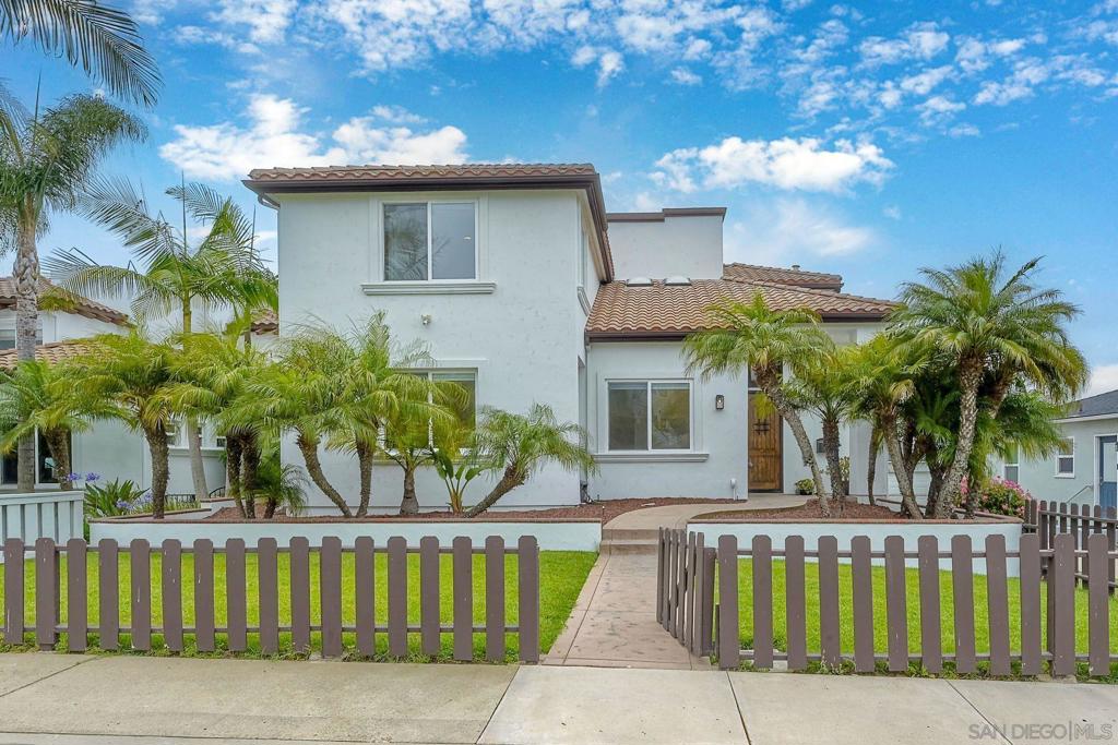 Nestled in the heart of Pacific Beach, this rare coastal residence offers 3,029 square feet of light-filled living space, panoramic ocean views, and an ideal layout for both relaxing and entertaining. Built in 2001 and thoughtfully upgraded throughout, this 4 bedroom, 3.5 bath home includes a flexible 5th bedroom currently used as a home office, complete with an electric fireplace and a sliding door to an expansive ocean-view deck. The main level welcomes you with a dramatic foyer featuring high ceilings, a skylight and luxury vinyl plank flooring. A spacious step-down living room open to a large ocean facing deck – perfect for taking in sunset views and city lights. The dining room with built-in cabinetry, flows seamlessly into the beautifully remodeled chef’s kitchen, complete with crisp white cabinetry, a wood-finished island, quartz countertops, Viking stainless steel appliances, 6 burner cooktop, double wall ovens, two sinks – a farmhouse sink and a prep sink-both under light filled windows, a beverage fridge, subway tile backsplash, and charming bay windows. Two guest bedrooms and a full bath are conveniently located on the main level. Upstairs, the bonus family room or office is bathed in natural light and leads to another large view deck shared with the luxurious primary suite.The primary bedroom boasts a wall of windows, private deck access, and a spa-inspired ensuite bath with a jetted tub, separate shower, and skylight. An additional ensuite bedroom and laundry room complete this level. Ascend to the rooftop deck to take in breathtaking panoramic views of the Pacific Ocean, city skyline, and evening lights-there’s even a 50-amp outlet ready for a hot tub. The lower level includes a mudroom with direct access to a two-car garage and covered carport. The fully fenced backyard features a grassy area and gated alley access. A rare opportunity to own a move-in-ready view home in one of San Diego’s most desirable beach communities! Within La Jolla School District close to Pacific Beach, Bird Rock, restaurants, coffee shops, boardwalk and La Jolla Shores Beach.