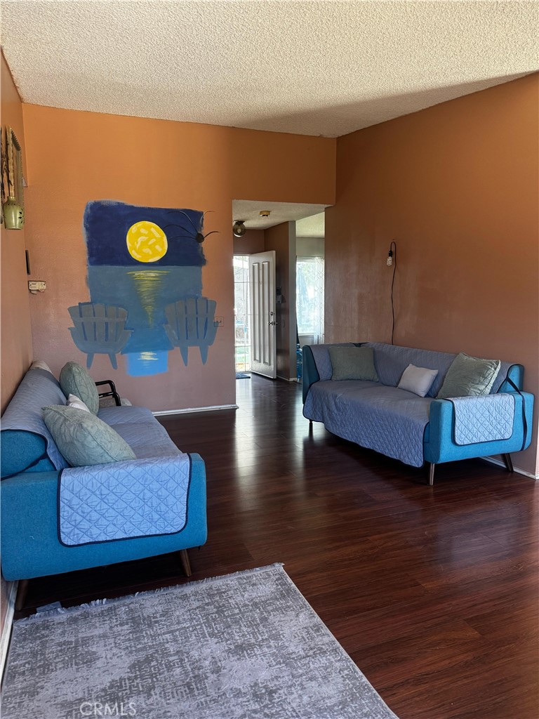 Brand New Roof, Move In Ready, Great Location of Prime Moreno Valley. This home offers the perfect blend of suburban comfort and city convenience. Single story home awaits you in one of the quiets neighborhoods of the city. This well-maintained 3-bedrooms, and 2 bathrooms home offers comfort, convenience, and a great value in the heart of the Moreno Valley near from Moreno Valley mall, restaurants, grocery stores, John’s Incredible Pizza, 60 and 215 freeways and home depot is 5 min away. Inside the home, you’ll find a spacious living room with a fireplace located at the living area, All 3 bedrooms have high ceiling as well. The floor plan is mix of tile, and carpet flooring throughout. The backyard is perfect for outdoor gatherings, providing shade, privacy and a serene retreat or you can extent to a bigger home. You can also plan to have an ADU in your back yard to have an extra income. You will like this property and call it "HOME"