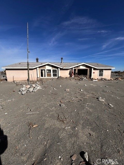 Photo of 2300 Olivera Rd, Phelan, CA 92371 (MLS # HD26034147)