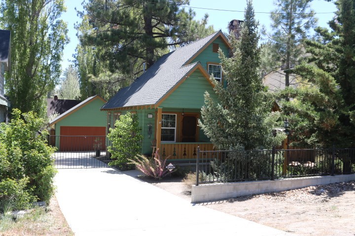 Wonderful Central Location by Big Bear Village. This is a very Cute 3 Bedroom Cabin with a 2 Car Garage and Fenced back Yard. Near all kinds of fun events: Restaurants, Night Clubs, Shopping, Car Shows. Woodsey Interior and a Great Rock Fireplace. Room for Workshop in Garage. Laundry Hookups, Dual Pane Windows. Covered Front and Back Porches. Minutes from Ski Resorts, Lake and National Foret Trails. Easy to Show, Call Agent to make arrangements.