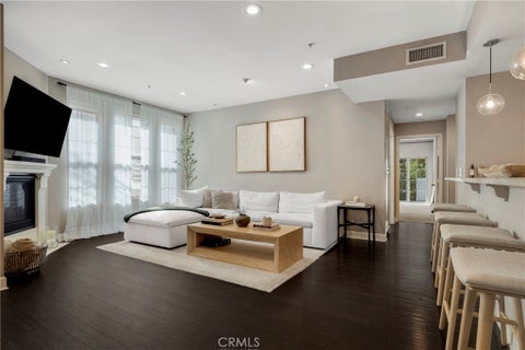 Photo of 10639 Woodbridge Street #206, Toluca Lake, CA 91602 (MLS # SR26191444)