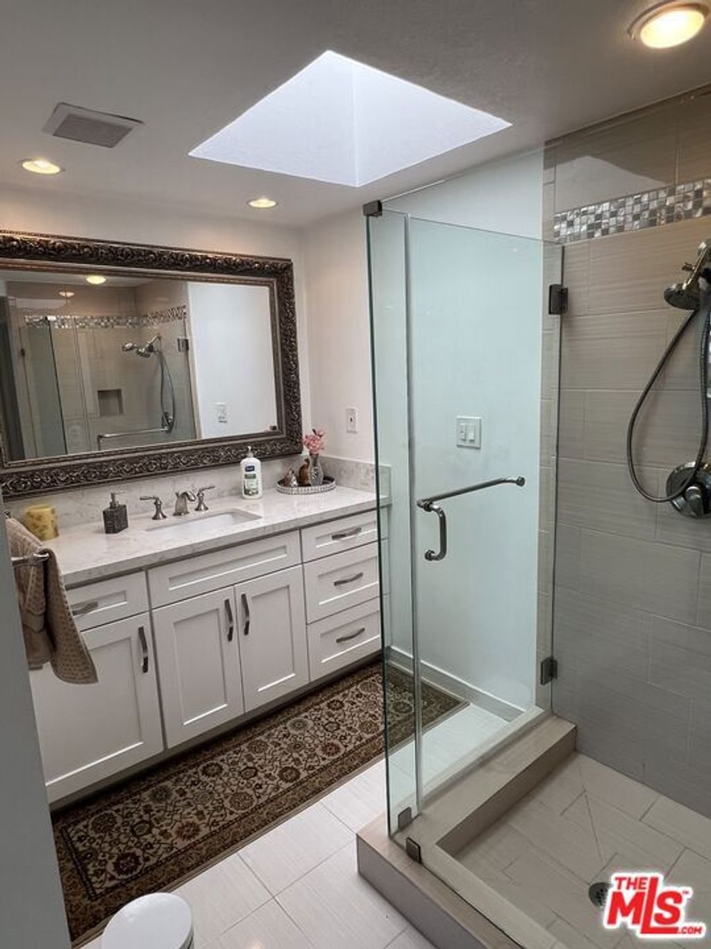 Photo of 289 S Barrington Avenue #A307, Los Angeles, CA 90049 (MLS # 25628079)