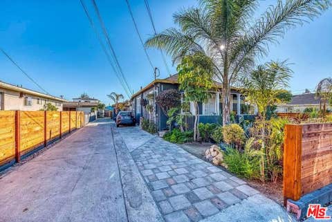 Photo of 1588 1/2 W 36th Street, Los Angeles, CA 90018 (MLS # 26875805)