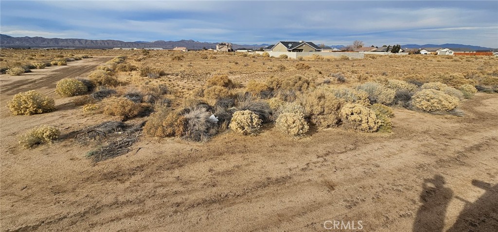 Welcome to 0 Milner Drive, a spacious and versatile vacant lot located in the heart of California City. Spanning approximately 7,087 square feet of land, this property offers an impressive space, making it an excellent opportunity for builders, investors, or anyone looking to create their own private retreat in a peaceful and expanding desert community.
Nestled in a quiet residential neighborhood, this lot provides the perfect blank canvas for a custom-built home, vacation getaway, or long-term investment. The expansive size of the lot allows for ample design flexibility, with room for a large residence, garage, outdoor living areas, and more. Whether you're dreaming of a modern desert escape or a traditional single-family home, this lot can accommodate your vision.
California City continues to grow, drawing interest for its affordable land prices, wide-open spaces, and potential for future development. With convenient access to local amenities, parks, schools, and highways, this property combines rural tranquility with accessibility. Utilities are nearby, making the development process more straightforward.
Don’t miss this opportunity to own a piece of land with endless possibilities—build now or hold for the future. 0 Milner Drive is a smart choice for buyers looking to invest in the growing California City market.
