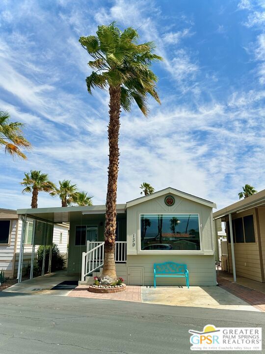 Welcome to Desert Shadows RV Resort, a premier 55+ gated community offering the ultimate desert lifestyle. This pristine park model home is move-in ready, featuring a spacious California room perfect for relaxing or entertaining, a charming kitchen with stylish tilework, a dishwasher, range, and oven, plus the convenience of an in-unit washer and dryer. The home also boasts a large yard, a storage shed, and breathtaking mountain views from every window. The entire unit was renovated withing the past 4 years with new roof, new air conditioner and brand new dual pane windows throughout. This vibrant community of 460 units provides a secure and private environment with exceptional amenities. Enjoy six sparkling pools, two large clubhouses, and three satellite clubhouses. Stay active with sunken, lit tennis and pickleball courts, an indoor shuffleboard pavilion, and a fully-equipped fitness center. The library with Wi-Fi and broadband, along with card and hobby rooms, and a woodshop, provide endless opportunities for learning, socializing, and exploring your interests. A 1,600 sq. ft. ballroom and picnic areas add to the charm, ensuring there's always something exciting to do. Desert Shadows RV Resort makes life easy with premium TV, high-speed internet, water, trash, and recycling services included. This is senior living at its finest, where you can enjoy a thriving social community, unparalleled amenities, and the beauty of the desert. You could not get a condo in the Palm Springs area for the price of this tiny home. Don't miss your chance to own this incredible tiny home and experience the lifestyle you deserve. Schedule your private showing today!