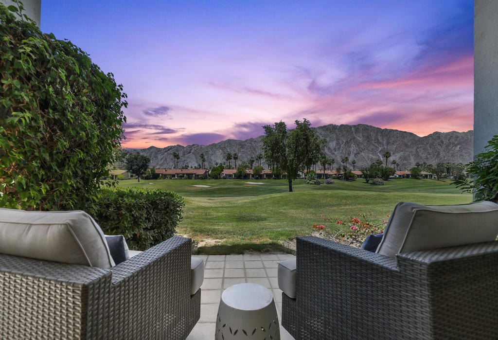 This fabulous condo overlooks the 7th fairway of the Arnold Palmer Private Golf Course with spectacular west-facing panoramic views of the Santa Rosa Mountains. These stunning vistas can be enjoyed from inside the home as well as from the patios off the living room and primary bedroom.The interior is open and spacious, featuring high ceilings and shutters throughout. The expansive primary bedroom is ensuite, complete with a full bathroom and slider access to a private patio. This popular Champion 1 floor plan is offered turnkey furnished per the inventory list, making it truly move-in ready. A brand-new roof was completed in summer 2025, providing peace of mind for the new owner.Residents enjoy access to a community pool and spa just a short walk away. The HOA also covers internet, cable, exterior condo insurance, front and back green area landscaping (excluding courtyards), pest control, and roof maintenance....making this an easy, lock-and-leave desert retreat.
