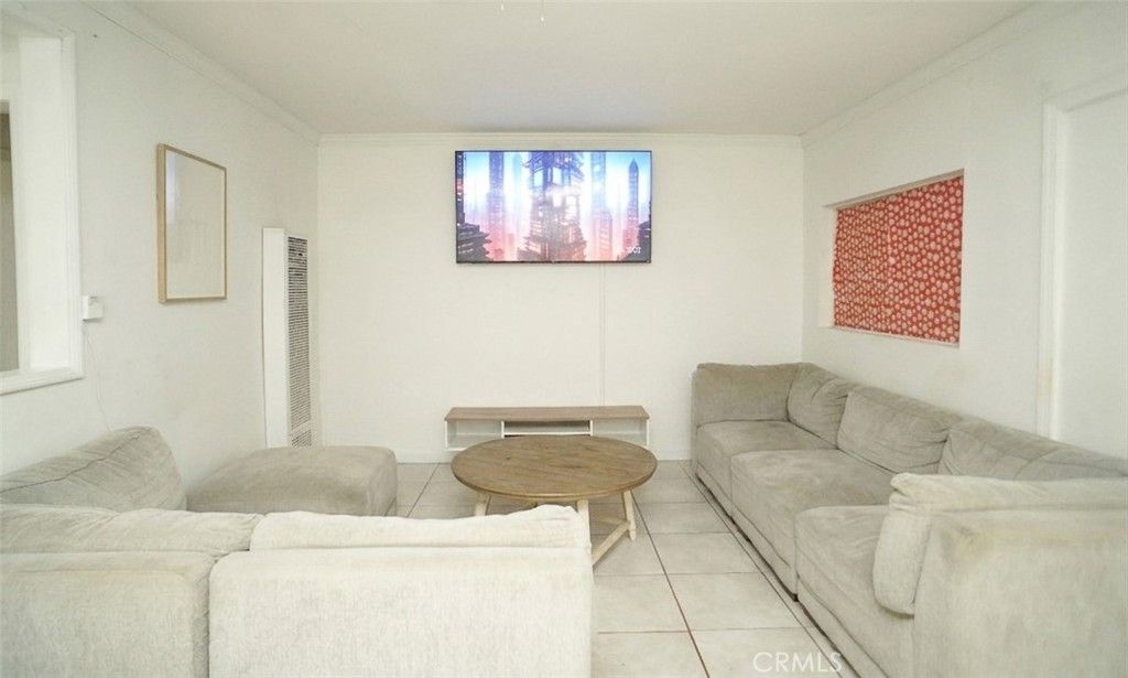 Photo of 815 W 134th Pl, Compton, CA 90222 (MLS # DW26085060)