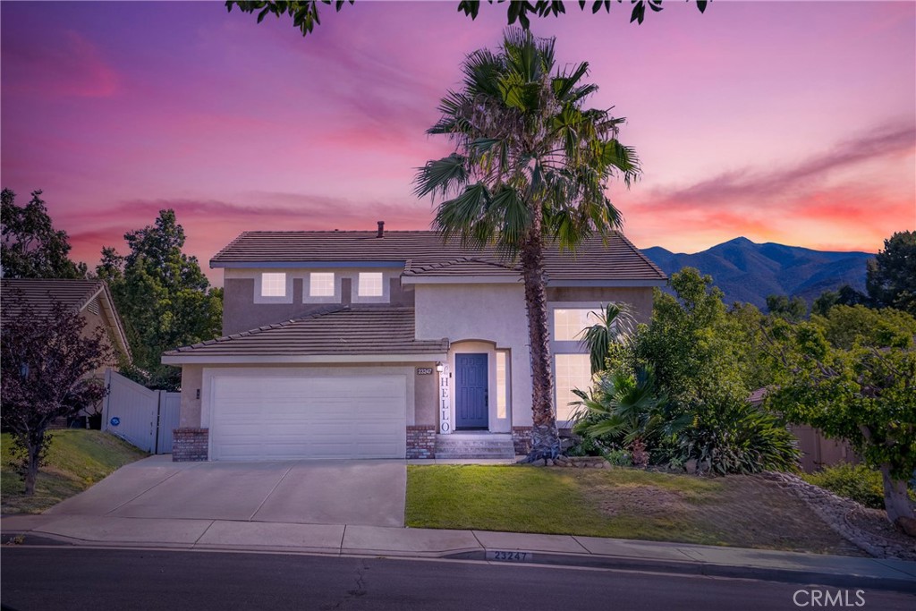 Welcome to 23247 Coffee Berry Circle, a beautifully upgraded 5 bedroom, 3 bathroom home with a 2-car garage, tucked away in a quiet cul-de-sac in the highly sought-after Wildrose community of South Corona. Located in a top-rated school district, this spacious residence offers a rare and versatile layout featuring two downstairs bedrooms—perfect for guests, extended family, or a private office setup. The home is filled with natural light, and the upgraded kitchen is ideal for everyday living and entertaining, with modern finishes and a seamless connection to the family room.
Upstairs, enjoy sweeping mountain views that create a tranquil retreat-like setting. The large backyard is perfect for entertaining or relaxing, complete with fruit trees and plenty of open space to customize to your liking. A convenient storage shed is tucked into the side yard, offering extra functionality for tools or seasonal storage.
This home is ideally located near Riverside Medical Center, and just a short drive to Dos Lagos for shopping, dining, and entertainment. Enjoy nearby amenities like Glen Ivy Hot Springs, Glen Ivy Golf Course, and Tom’s Farms—all just minutes away. With low taxes, a low HOA, and easy access to the 15 freeway, this home checks all the boxes for comfort, convenience, and lifestyle in one of Corona’s most desirable neighborhoods.
Don’t miss your chance to call this exceptional property your next home—schedule your private tour today before it’s gone!