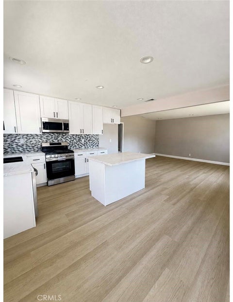 Photo of 575 E Fernleaf Ave, Pomona, CA 91766 (MLS # DW26194132)