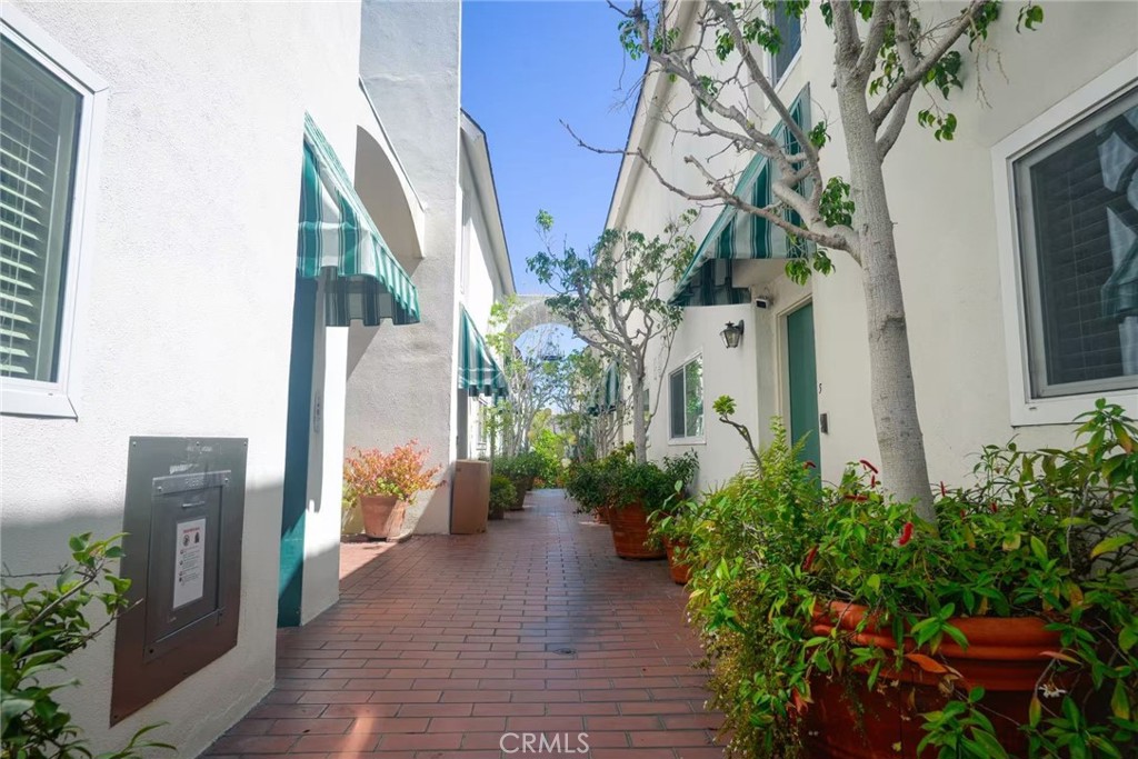 Dramatic designer townhouse has been featured on HGTV! Discover an updated unit townhouse in a truly unique Westwood community. This 2-bedroom, 2.5-bath residence, spans 1,263 square feet of open living space with high ceilings and a generous private patio just outside the living room.Wonderful city and mountain views from the huge, private rooftop deck with lots of greenery, cozy patio, ideal for relaxation or entertaining. to It's very European feel of this complex, Inside, enjoy an open layout complemented by convenient in-unit laundry, central air, and new stainless-steel appliances.The primary suite offers ample space with front-facing views, while the second bedroom features its own bath and spacious closet. The gated garage provides dedicated side-by-side two parking spaces with extra great storage space.You are allowed to put your own permitted electric car charging hookup. Very bright unit with front & rear exposure. Move-in condition. Elevator to garage. Earthquake Insurance, Pets friendly.
The building's community is exceptionally welcoming and friendly, and will help you feel right at home in this wonderful west Los Angeles neighborhood. Half mile from 10/10 Fairburn Ave Elementary School; About 5 minutes from UCLA and Century City mall. Easy access to 405 & 10 freeway.