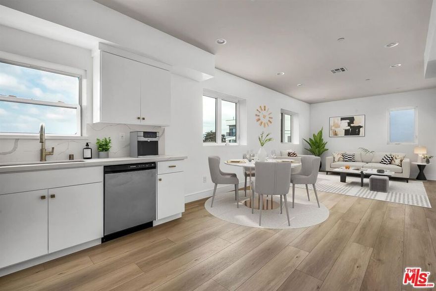 Meet 4701 Saturn Street, a sophisticated brand new modern townhome style residence with views of Hollywood Hills/Century City and Los Angeles! This 3 bedroom, 3 bath is beautifully designed, full of natural light and airy color palette with many luxurious features including: ample sized bedrooms and closets, hardwood flooring, recessed lighting, gorgeous kitchens with quartz counter tops, new cabinetry, stainless steel appliances, in unit washer and dryer as well as central ac/heating. The stunning bathrooms offer vanity storage, sleek quartz counter tops and elegant tile work in the shower. This new construction community is conveniently located close to the best neighborhoods of los angeles, minutes away from West Hollywood, Hancock park, Lacma, The Grove and Miracle Mile. Be the first! 2 car parking included. The price factors in a 6 week free move in special, the base rent is $4,295/mo.