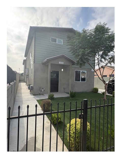 Photo of 720 W Cherry Street, Compton, CA 90222 (MLS # SW26002671)