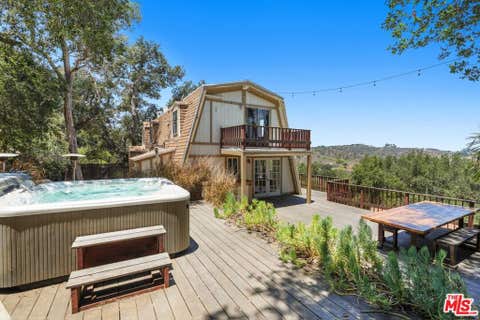Photo of 22013 Upper Alta Drive, Topanga, CA 90290 (MLS # 26844209)