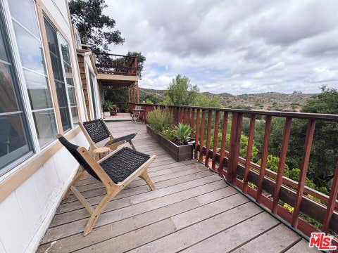 Photo of 22013 Upper Alta Drive, Topanga, CA 90290 (MLS # 26844209)