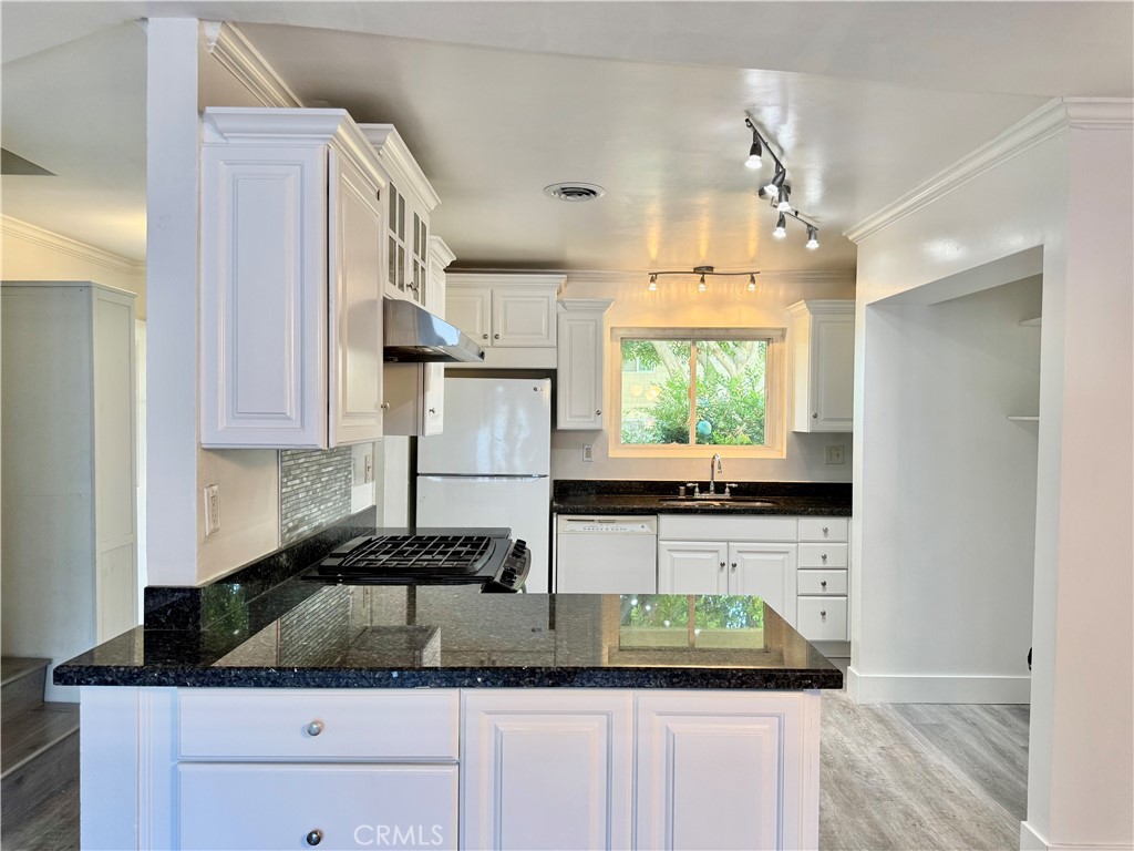 Step into a freshly renovated modern home with thoughtful upgrades throughout. Nestled in North Azusa near the San Gabriel Mountains, this move-in ready residence features new flooring, upgraded cabinets, sleek fixtures, and smooth ceilings for a fresh, contemporary feel. The open-concept design connects living, dining, and kitchen spaces seamlessly, with updated closets adding everyday comfort. Nearby shops, dining, and schools make this location as convenient as it is inviting.