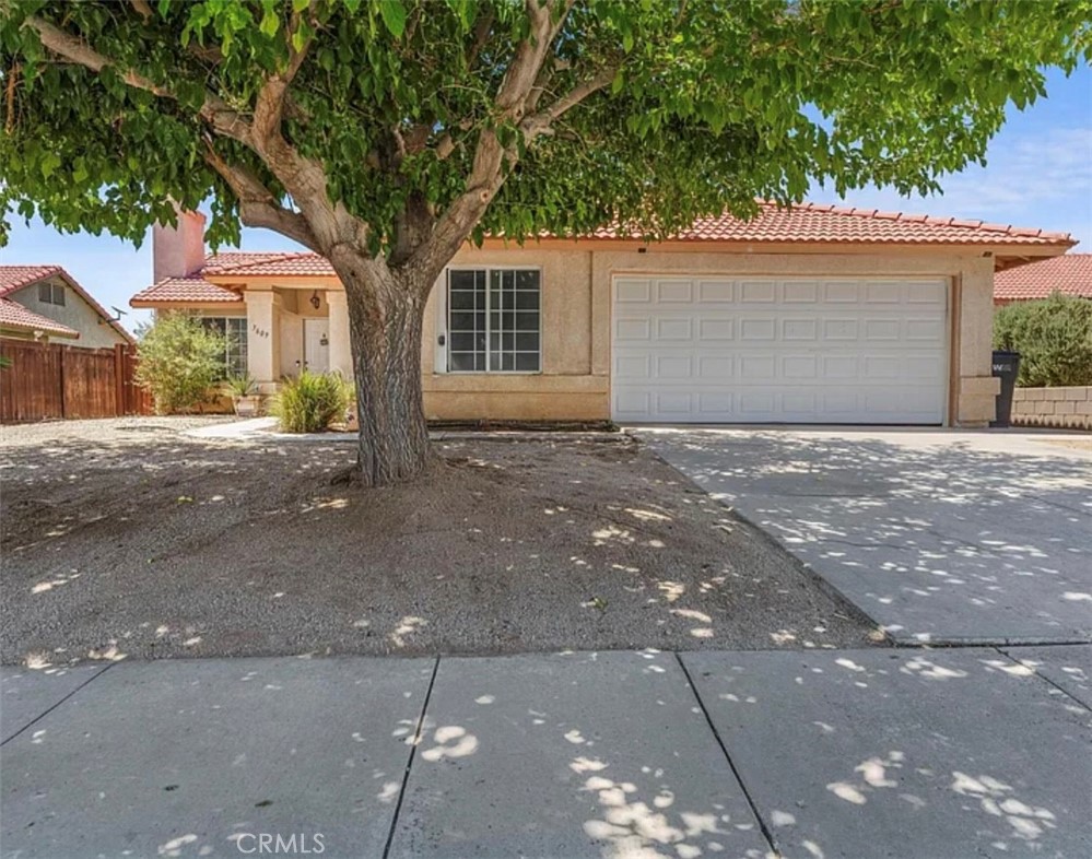 Fantastic Opportunity on this 3 bedroom, 2 bathroom home with finished bonus room that's been updated and upgraded. The galley kitchen features granite counter tops and back splash with expresso color cabinets and tile flooring. Dining area open to family and a fireplaced living room. The finished bonus room currently being used as a theatre room. The master suite has vaulted ceilings and a 3/4 bathroom with dual vanities. The 3rd bedroom can be used as an optional den/office area if desired. The large rear yard is an entertainers delight with a full length covered patio with bar area, green grass a shade tree and dog run. This home is located in a very convenient location to Edwards Air Force Base