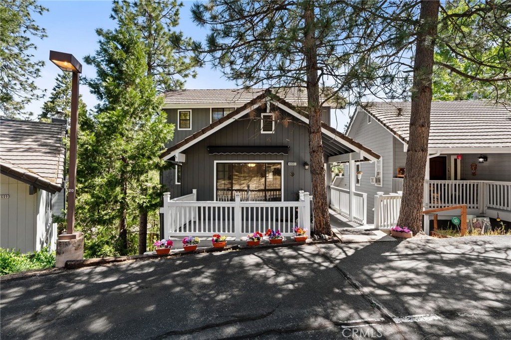 Welcome to your cozy mountain escape—nestled in the heart of Bass Lake, where the pines sway, the air is crisp, and life slows down just enough for you to truly breathe.
This beautifully updated 3-bedroom, 2.5-bath home offers the perfect blend of modern comfort and rustic charm. Recently remodeled and meticulously maintained, it features inviting living spaces, vaulted ceilings, and warm natural light that pours through every window. From the upgraded kitchen with stainless steel appliances to the charming wood-style floors and timeless details, this home is move-in ready and waiting for your next chapter.
Step out onto the front deck and take in the peaceful forest views, or rear deck with treetop views provide the perfect spots for morning coffee or an evening glass of wine under the stars. Entertain with ease in the spacious dining area that flows seamlessly into the living room. Whether you're gathering around the table with loved ones or cozying up for a quiet night in, this home delivers comfort and connection in every corner.
Enjoy low-maintenance living in a community that feels like a getaway—yet is just minutes from Bass Lake's scenic shoreline, boat docks, trails, and the gateway to Yosemite National Park.