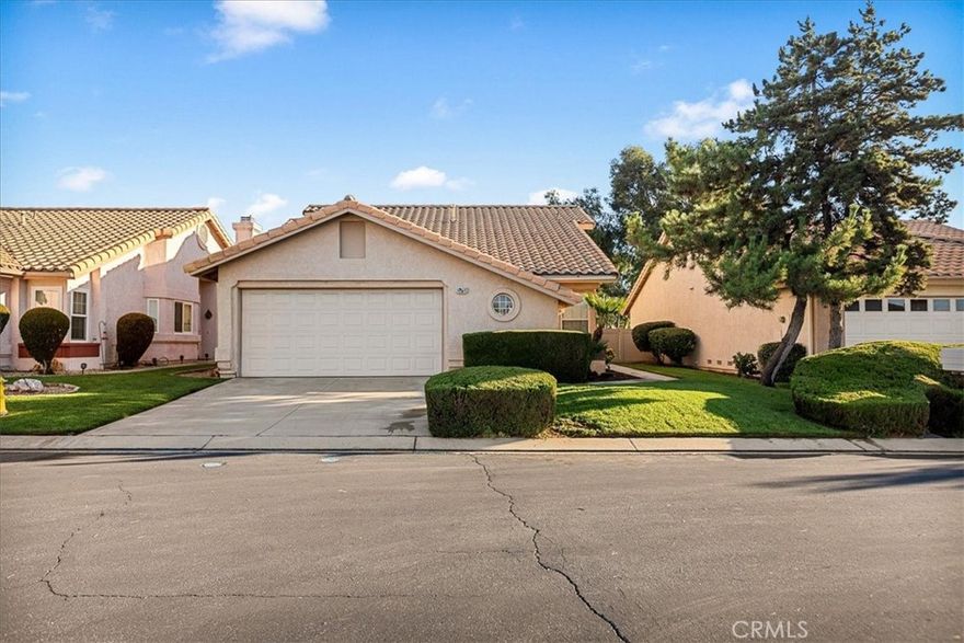 Located in the desirable Sun Lakes community, this move in ready 3 bed, 2 bath home sits on a prestigious 18 hole private golf course and offers an active adult lifestyle in a 55+ Community. It has resort style living. Features include high ceilings, newer interior paint, and laminate flooring throughout. The kitchen offers an eat in area, stainless steel appliances, and abundant natural light with views of the golf course. The spacious great room includes a fireplace with mantle. The primary suite features high ceilings, a walk in closet, sliding glass door to the backyard, and an en suite bath with walk in shower and vanity. The garage includes epoxy flooring, plus washer and dryer. Conveniently located near shopping, dining, and just 15 minutes to the beautiful Palm Springs. Enjoy golf course views and low maintenance living. Let's schedule your showing today!