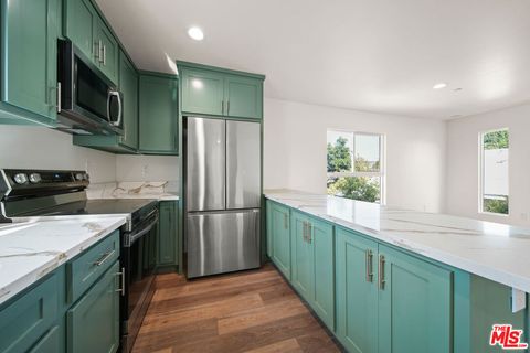 Photo of 1055 N Wilton Place #1/2, Los Angeles, CA 90038 (MLS # 25608717)