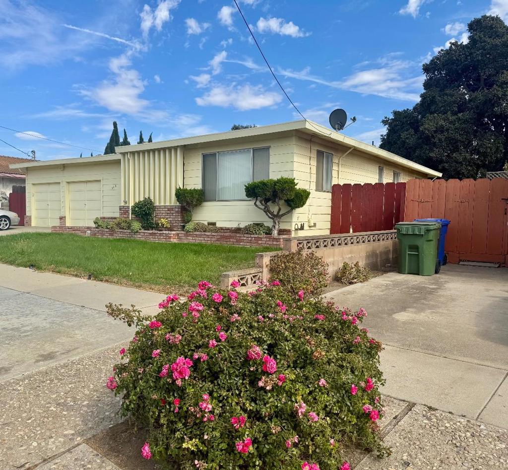 Welcome home! Character curb appeal abounds for this beloved home in Soledad's most popular established neighborhood close to schools and freeway access. Step back in time onto the front porch and through the old-fashioned wooden screen and solid wood door and find a spacious family room with large windows and custom window coverings. Remember the days when the mail came directly into the house? Yes, it's one of those houses. The eat-in kitchen/dining room is well-appointed with newer appliances, oodles of storage and a homey feel. The home has newer paint on the interior and steps down into an oversized, super clean 2 car garage with handy sink and then go outside - the backyard is beyond belief - enormous! A blank canvas of a fenced yard for your own little soccer team, an ADU, or some energetic puppies, the mature trees have stood the test of time. This is a great starter or investment home, ready for the next generation to love it. Buyer to satisfy self of any and all conditions of home, seller has not resided in home and agents deem info to be accurate, but do not guarantee.