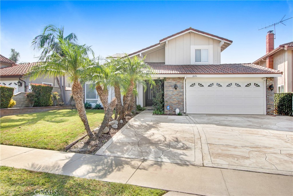 Desirable Park Vista Home in Sunny Hills School District!
Located on a quiet street, this beautifully upgraded 4 bed, 3.5 bath home features an open floor plan, vaulted ceilings, and two master suites with walk-in closets and walk-in showers. Move-in ready with all-new interior, custom steel front door, designer kitchen with island, farmhouse sink, quartz counters, backsplash, pro-grade stainless appliances, and pot filler. Upgrades include natural stone fireplace, designer flooring, LED recessed lighting, frameless showers, crown molding, and custom accent walls. Landscaped yard in a family-friendly neighborhood close to top-rated schools, parks, shops, restaurants, and Fullerton College. Family oriented neighborhood, this house is perfect to raise a family and enjoy life.