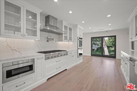 Photo of 11515 Thurston Circle, Los Angeles, CA 90049 (MLS # 26101705)