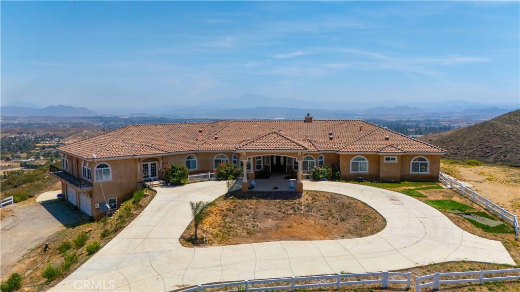 PRICE ADJUSTMENT!!! Welcome to 20365 Toney Street, a rare opportunity to own a sprawling 10-acre estate in the heart of Perris. This expansive 5,012 sqft home features 6 bedrooms, 6 bathrooms, and an office, offering ample space for comfortable living. Built in 2008, the residence boasts a tile roof, central heating and cooling, and an attached 867 sqft 4 car garage, with a bonus 890 sqft banquet/game room. The vast lot provides endless possibilities, whether you envision a private retreat, or agricultural pursuits. Enjoy the tranquility of rural living while remaining conveniently close to local amenities and major highways. This unique property combines space, comfort, and potential.
DON'T MISS YOUR CHANCE TO MAKE IT YOUR OWN.