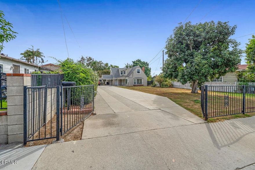 Enter into the charm of this 1938 Cape Cod Revival, thoughtfully updated while maintaining its timeless character. This 3-bedroom, 2-bathroom home with 1,734 sq. ft. combines comfort and style.Freshly painted with new grey laminate flooring, the home opens to a bright living room centered by a fireplace. The modern kitchen features black granite countertops, white cabinetry, and an adjoining laundry room, with space for both a breakfast nook and a formal dining area.A main-level bedroom with sliding doors connects seamlessly to the backyard, while upstairs offers two light-filled bedrooms and a second bath, accented by a stained-glass window on the stairway.Outdoors, enjoy an expansive front yard, ample parking, and a backyard designed for entertaining with a brick BBQ and plenty of space for gatherings.(Pet friendly, Utilities included: Water & Trash, Tenant(s) must have a minimum 650+ credit score, monthly net income of 3x the rent, security deposit the same as one months rent, minimum 13 month lease.