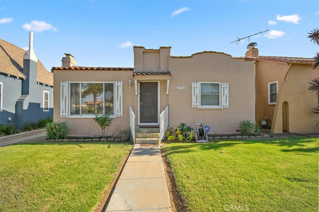 Step into the charm of a classic LA Spanish-style home, where timeless curb appeal meets thoughtful modern upgrades. This well-maintained residence welcomes you with inviting character and a warmth that’s hard to find. Inside, dual-pane windows fill the rooms with natural light while maintaining efficiency with the central AC system, and 17 solar panels provide sustainable energy savings. A versatile flex area with its own private entry can serve as an office, creative studio, or potential fourth bedroom ideal for multi-generational or nexgen living. With abundant space throughout, this home is perfectly suited for large families seeking comfort and flexibility. The heart of the home features a crisp white kitchen with quartz counters and sleek cabinetry, blending modern design with everyday functionality. The backyard has a screened patio, detached garage, paired with an extended driveway, offers ample parking and storage. Beyond the home, you’re only minutes from LA’s most exciting entertainment destinations, including SoFi Stadium, the Intuit Dome, and The Forum. This is more than a house it’s a lifestyle that combines historic charm with today’s conveniences, ready for its next chapter and new family to make new memories. This home qualifies for down payment assistance! Ask how! Schedule your showing appointment today!