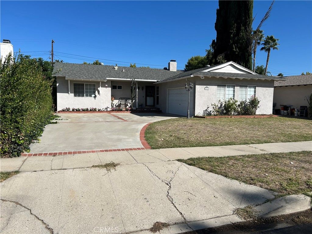 Photo of 22309 Hamlin Street, Woodland Hills, CA 91303 (MLS # SR25241190)