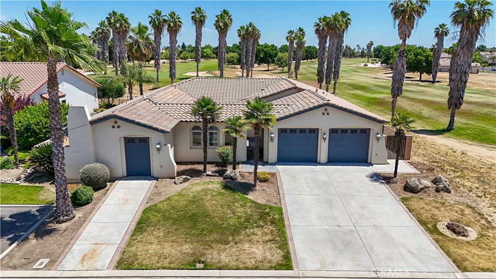This elegant semi-custom CalStar home offers hardwood floors, new carpet in the bedrooms and family room, and crown molding throughout most of the home. The kitchen features knotty pine cabinets, stainless steel appliances, granite counters and a warm, inviting design.
Enjoy two fireplaces, a panoramic one in the living room and another in the main suite, both overlooking the golf course. The luxurious main suite bath includes a jetted tub, pendant lighting, fully tiled shower, dual vanities and two walk-in closets.
Outside, relax in the private front courtyard featuring stamped concrete or on the back patio. The home offers an oversized garage plus a golf cart garage with extra storage. Home has so many amentities ask your agent for a feature list.