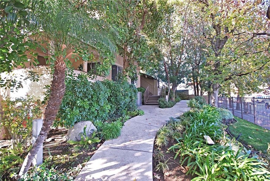 Welcome to this charming one-bedroom, one-bathroom condominium nestled within a secure gated community in the heart of highly desirable Chatsworth. This inviting home offers the perfect blend of privacy and convenience—just minutes from popular coffee shops, restaurants, shopping centers, parks, and major freeway.
Step inside to discover a bright and airy open floor plan filled with natural light. The spacious living room seamlessly connects to a private patio, creating an ideal space for relaxation. The generous kitchen, located adjacent to the breakfast nook, offers ample cabinet and counter space. The large bedroom features a walk-in closet, and the well-appointed bathroom provides added comfort and functionality.
Additional highlights include storage space, newer AC, and included appliances such as a refrigerator, washer, and dryer. Residents will also enjoy the serene ambiance of the community grounds and access to a refreshing community pool.
Move-in ready—this is a home you don’t want to miss!