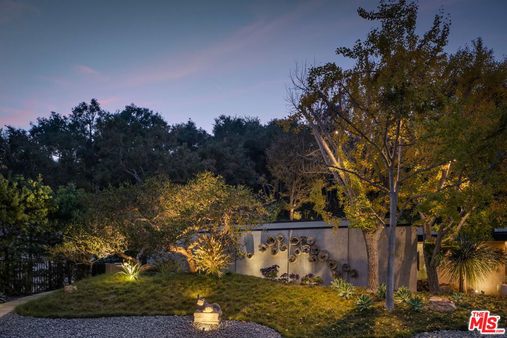 Photo of 1087 Moraga Drive, Los Angeles, CA 90049 (MLS # 25617075)