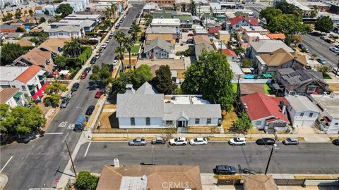 Photo of 3425 W 15th Street, Los Angeles, CA 90019 (MLS # SB25197329)