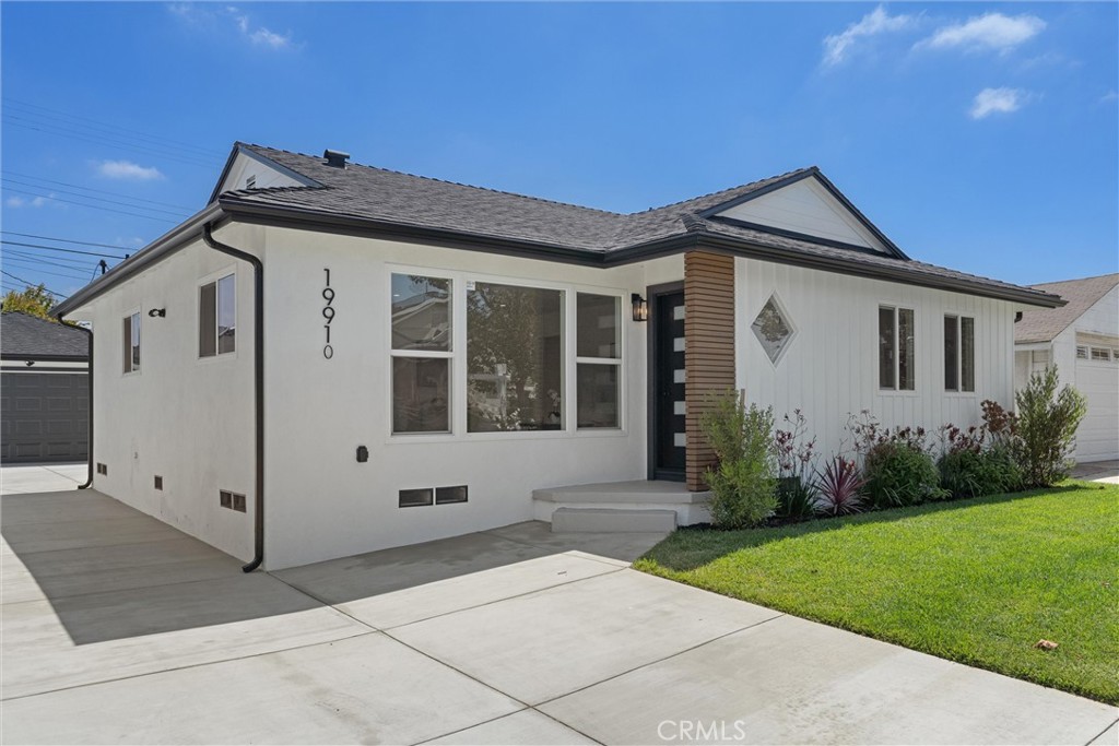 Charming, fully renovated West Torrance home featuring a light-filled open floor plan, modern finishes, and seamless indoor/outdoor living. Nestled on a picturesque street, this thoughtfully updated residence showcases contemporary upgrades both inside and out.
The airy interior is flooded with natural light and centers around a beautifully renovated kitchen, complete with new recessed lighting, custom walnut cabinets and woodwork, quartz countertops, stainless steel appliances, a designer island hood, sink and faucet, tile backsplash, and floating walnut shelves. A cozy dining nook with a picture window is perfect for morning coffee, while the bright living area flows effortlessly from the kitchen, ideal for entertaining.
This home offers two brand-new bathrooms: a spacious walk-in shower in the hallway bath and a tub/shower combo in the primary suite. Modern updates continue with waterproof vinyl floors, energy-efficient vinyl windows, an HVAC system, new doors, baseboards, trim, smooth-textured walls, interior wiring, and fresh water lines and drains.
Outside, enjoy newly landscaped front and rear yards, a freshly poured concrete driveway and patio, and ample room for RV parking—perfect for gatherings and outdoor activities. The finished, detached two-car garage provides versatile space for a home office, gym, or game room.
This move-in ready home combines modern comfort with great curb appeal—truly a true gem in West Torrance. More pictures coming soon!