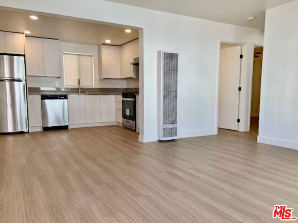 Welcome to 626 N Kingsley Dr the perfect place to call home! Explore our newly renovated 1, 2, and 3-bedroom bungalows and apartments. Nestled off Melrose Avenue in the lively Melrose Hill neighborhood of Los Angeles, our residences offer a unique living experience. Our 2-bedroom flats redefine modern living. Experience open-concept spaces with updated kitchens, brand-new stainless steel appliances, custom cabinets, and stunning stone countertops. Bedrooms feature ceiling fans and sliding closet doors for added comfort. Step into luxurious bathrooms with beautiful new subway tiles and contemporary fixtures. Stay cool year-round with brand new AC units ensuring a comfortable living environment.