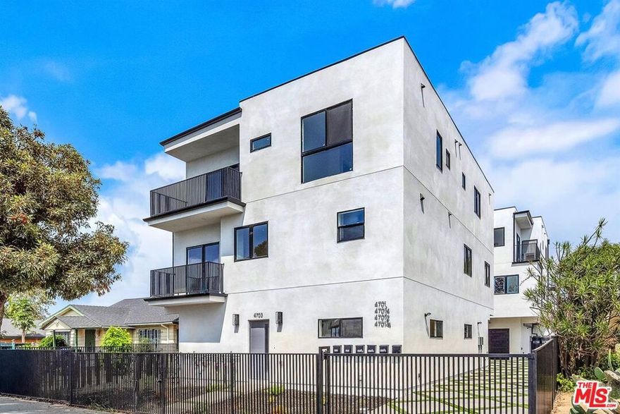 Meet 4703 Saturn Street, a sophisticated brand new modern townhome style residence with views of Hollywood Hills/Century City and Los Angeles! This 5 bedroom, 6 bath is beautifully designed, full of natural light and airy color palette with many luxurious features including: ample sized bedrooms and closets, hardwood flooring, recessed lighting, gorgeous kitchens with quartz counter tops, new cabinetry, stainless steel appliances, in unit washer and dryer as well as central ac/heating. The stunning bathrooms offer vanity storage, sleek quartz counter tops and elegant tile work in the shower. This new construction community is conveniently located close to the best neighborhoods of los angeles, minutes away from West Hollywood, Hancock park, Lacma, The Grove and Miracle Mile. Be the first! 2 car parking included. The price factors in a 1 month free move in special, the base rent is $5,995/mo.