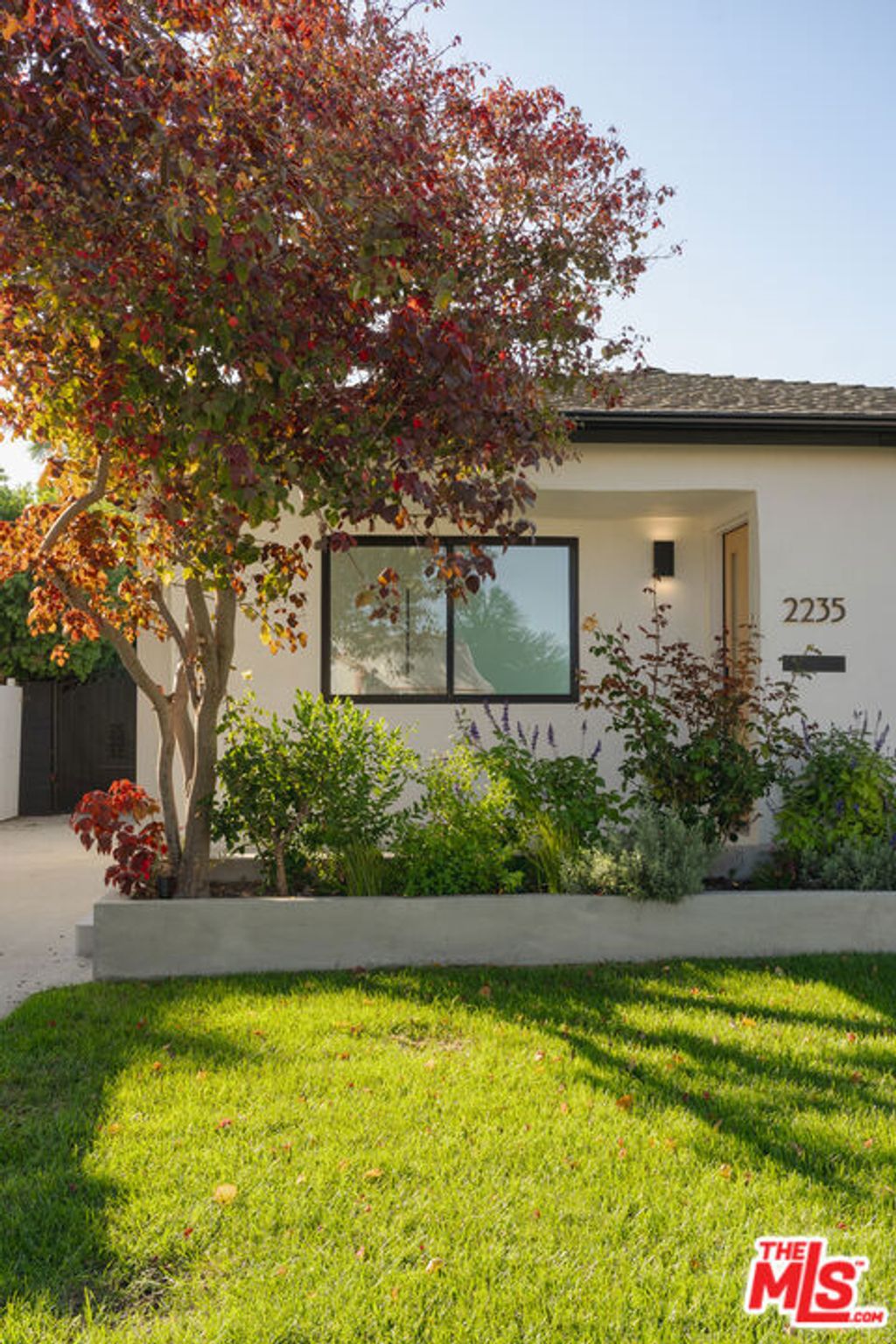 Photo of 2235 S Mansfield Avenue, Los Angeles, CA 90016 (MLS # 25602761)