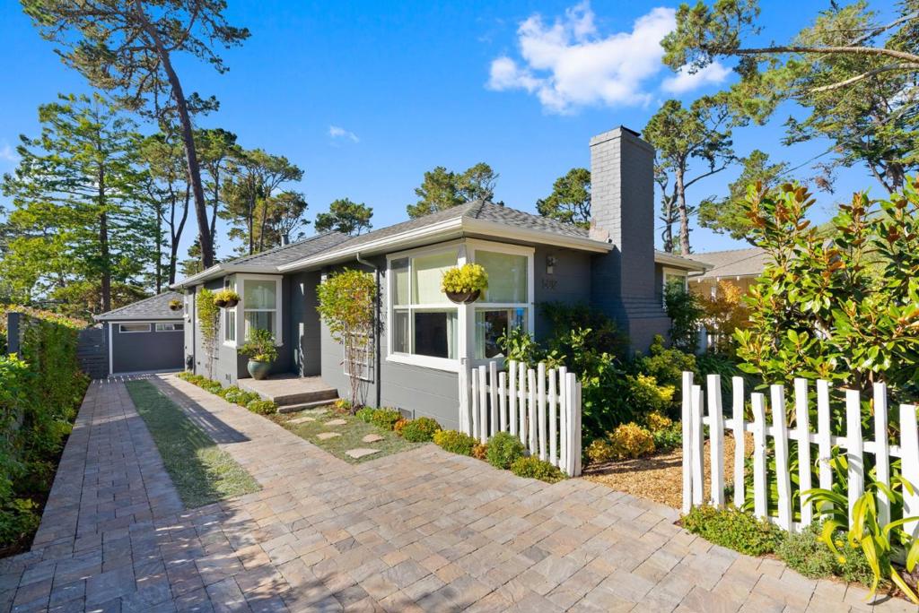 Welcome to 5012 Monterey Street, a tranquil zen oasis that seamlessly blends modern upgrades with timeless elegance. As you arrive at the home, you are immediately drawn to lush gardens, adorned with beautiful roses, strawberries, and lemon trees. The back deck is an idyllic spot to savor your morning coffee, while evenings are best enjoyed by the firepit. The property boasts two spacious bedrooms, a generously sized bathroom with a tub and shower, and a detached garage. With an oversized living room perfect for entertaining, and a separate dining room this home offers a comfortable and spacious layout. This property has seen significant improvements including a new roof, windows, custom shades, doors, extensive landscaping enhancements, a new deck, driveway, fencing, lighting, and more. Conveniently located just minutes from Downtown Carmel, Pebble Beach, and the stunning Monterey Peninsula, embrace the Carmel lifestyle in this beautifully renovated cottage.