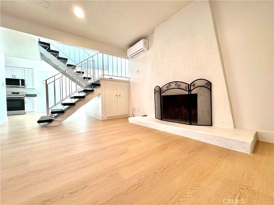 Beautiful, quiet 3-bedroom 2-bath unit, in excellent condition, remodeled with many new upgrades, like new countertops, cabinets, doors, paint, microwave oven etc. Close to everything: freeways, colleges, restaurants, shopping plazas. All bedrooms upstairs. Washer, dryer, hookup. One garage and one additional assigned parking space. Water, trash services included. Looking for long-term stable tenants.