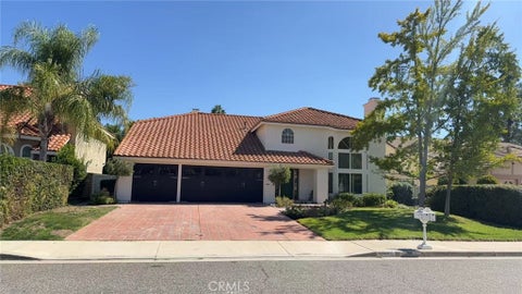 Photo of 5706 Tenneyson Drive, Agoura Hills, CA 91301 (MLS # OC26207029)